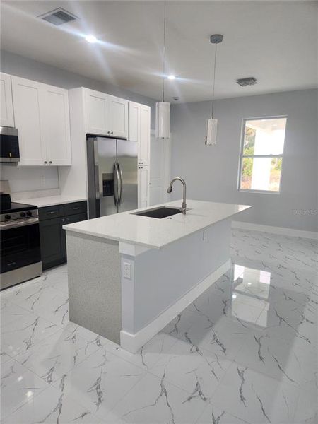 Furnished interior view inside a new home in , Port Charlotte (Image 10).
