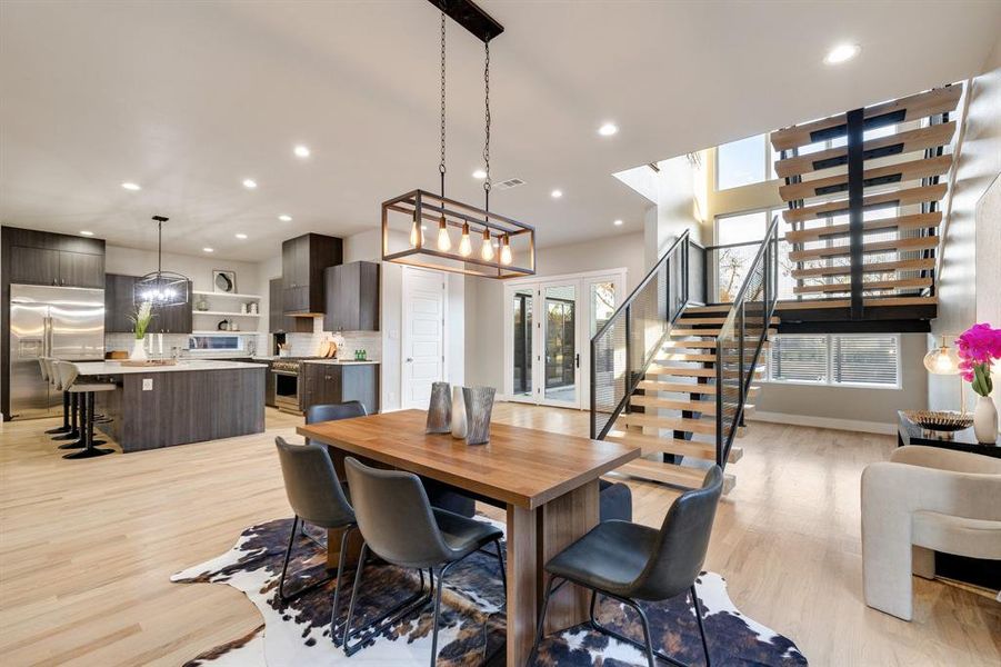 Dining room with light hardwood / wood-style floors