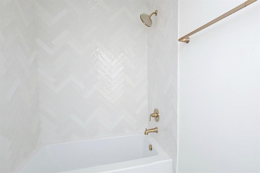 Bathroom featuring bathing tub / shower combination