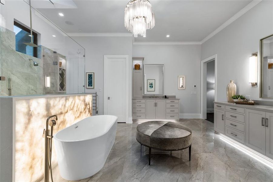 Bathroom with separate shower and tub, crown molding, vanity, and an inviting chandelier