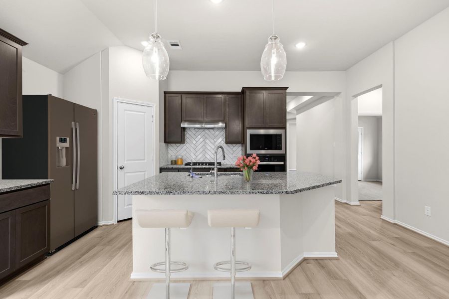 Furnished interior view inside a new home in Grand Central Park, Conroe (Image 12).