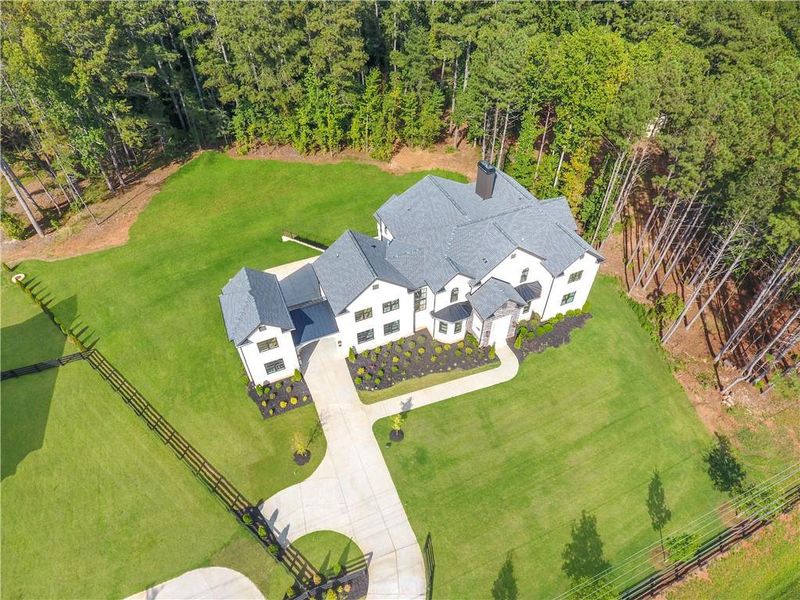 Front exterior of a new home in , Milton, GA, highlighting curb appeal (Image 2).