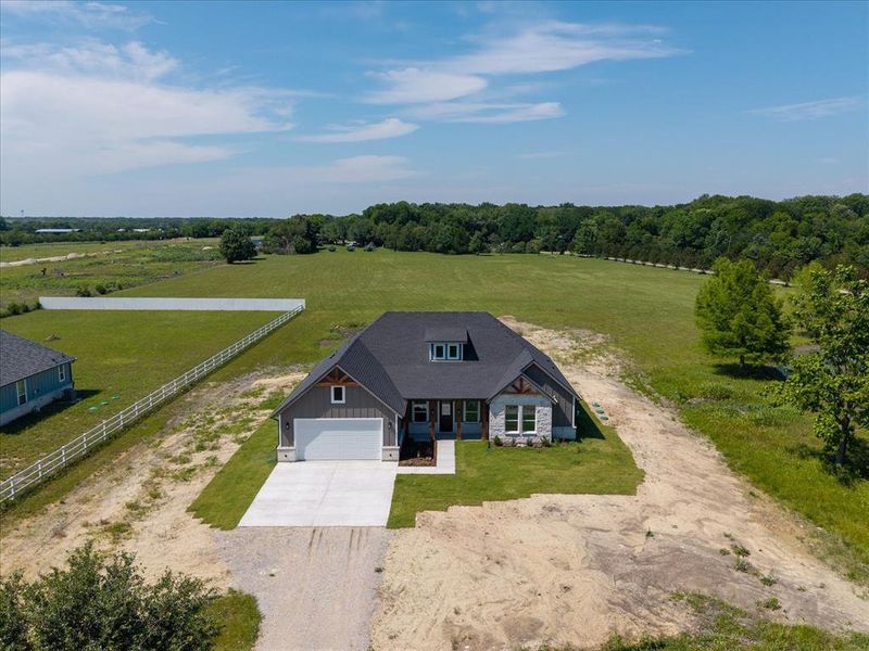 Front exterior of a new home in , Leonard, TX, highlighting curb appeal (Image 21).