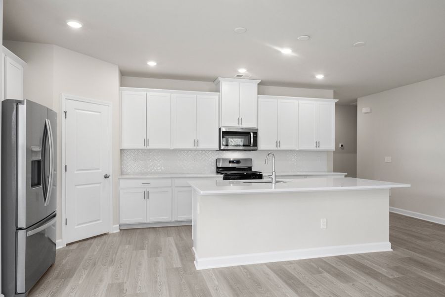 Furnished interior view inside a new home in Cypress Ridge - The Coastline Series, Longs (Image 3).