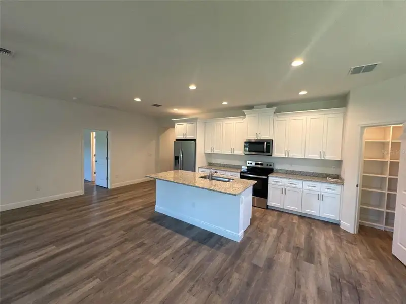 Furnished interior view inside a new home in , Apopka (Image 2). Furnished interior view inside a new home in , Apopka (Image 2).