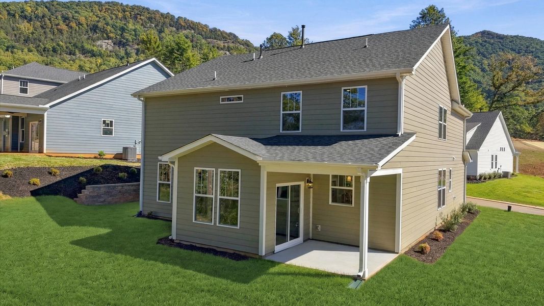 Exterior details and patio area of a home in The Wilds at Cedar Mountain, Asheville (Image 23).