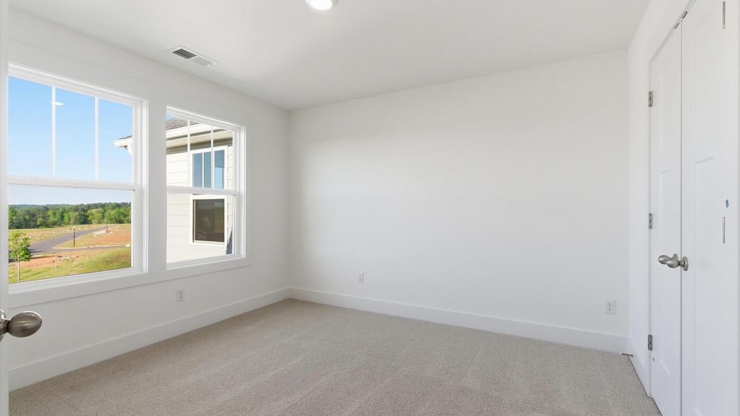 Furnished interior view inside a new home in Benjamin's Grove, Woodruff (Image 26).