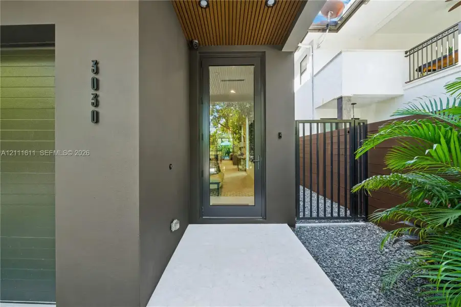 Exterior details and patio area of a home in , Miami (Image 22). Exterior details and patio area of a home in , Miami (Image 22).