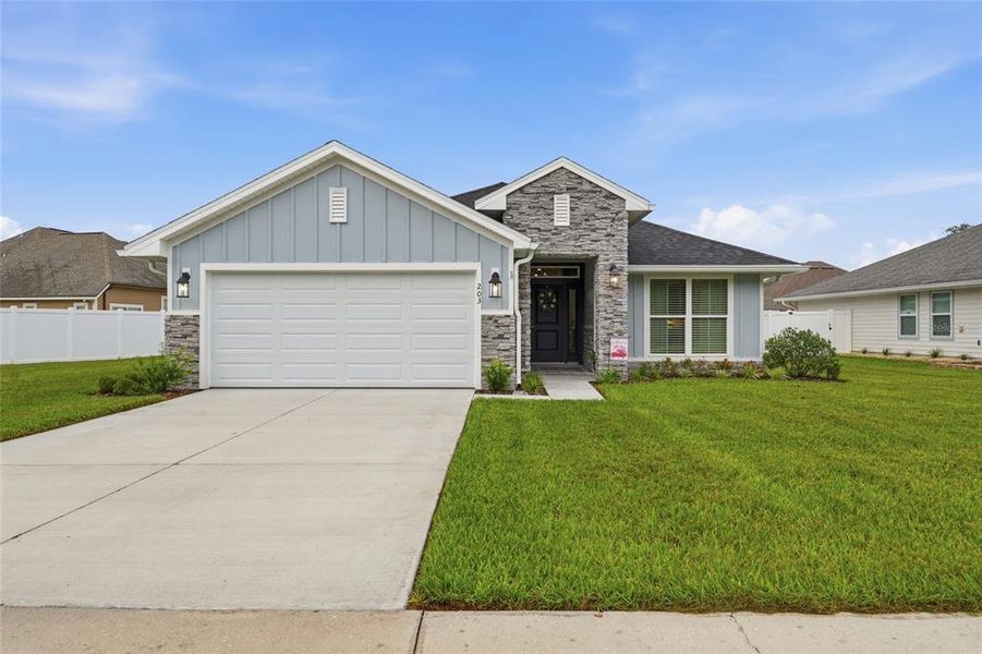 Front exterior of a new home in , Lake City, FL, highlighting curb appeal (Image 21).