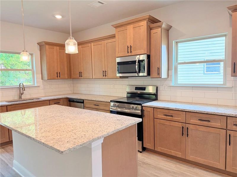 Furnished interior view inside a new home in Magnolia Villas, Cornelia (Image 6).