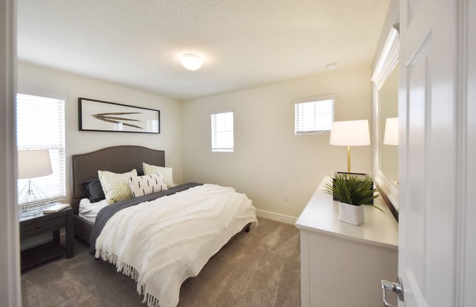 Furnished interior view inside a new home in Caloosa Cove, Labelle (Image 8).