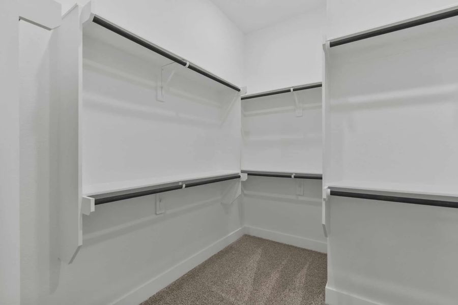 Representative unfurnished interior of a home built from the Sorenstam by Chesmar Homes in Riceland Alley Loads, Mont Belvieu (Image 25).