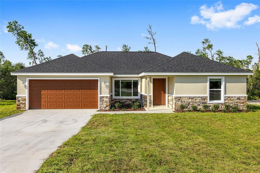 Front exterior of a new home in , Ocala, FL, highlighting curb appeal (Image 31).