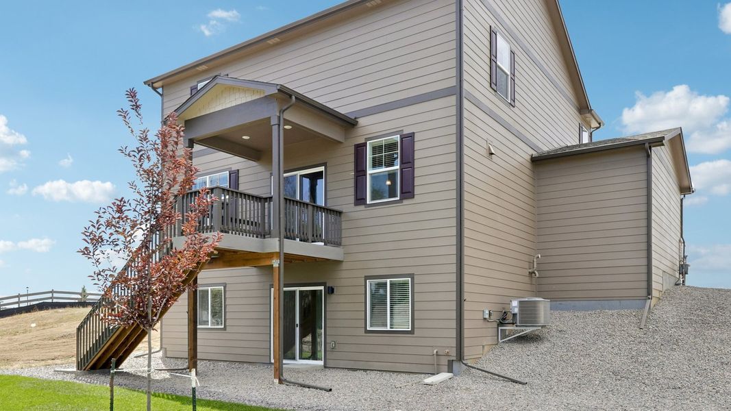 Exterior details and patio area of a home in Vantage, Berthoud (Image 4).