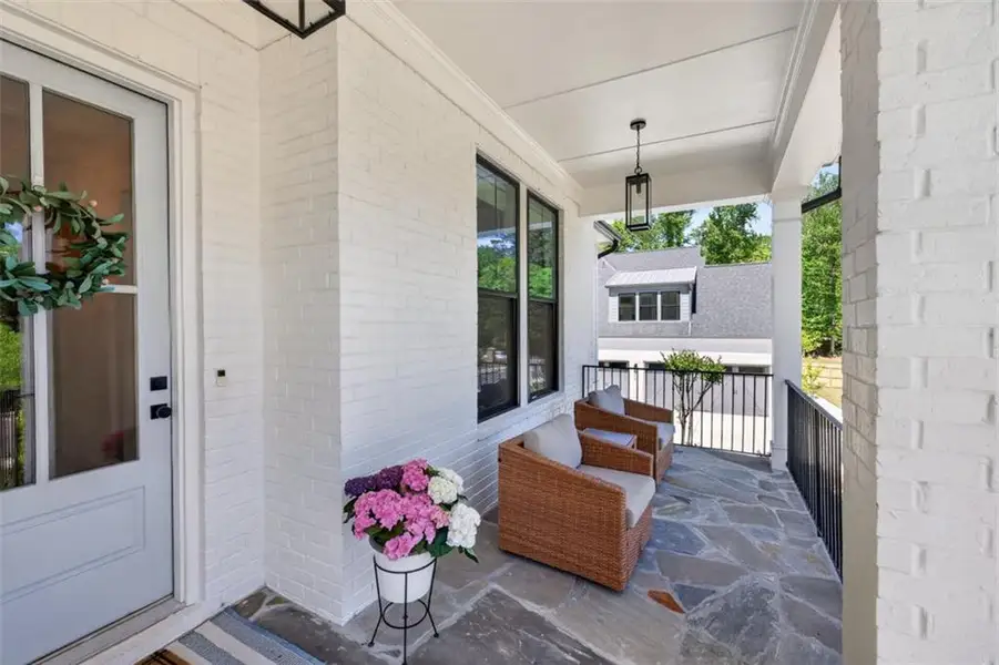 Exterior details and patio area of a home in Town Farms, Peachtree Corners (Image 34).