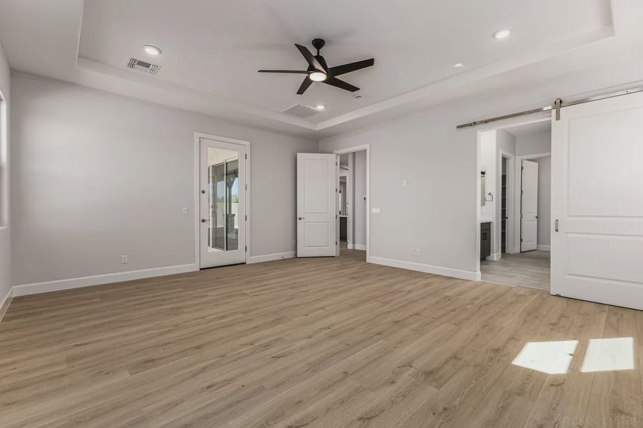Spacious, unfurnished interior of a new home in Bellero Estates, Queen Creek (Image 20).