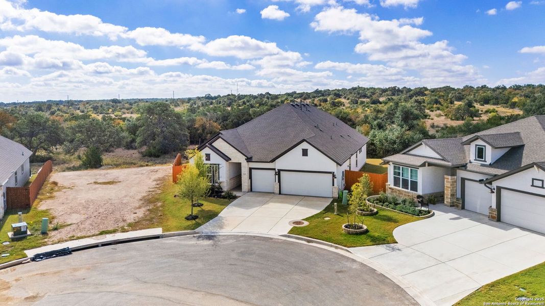 Front exterior of a new home in Meyer Ranch – Legacy Series, New Braunfels, TX, highlighting curb appeal (Image 2).