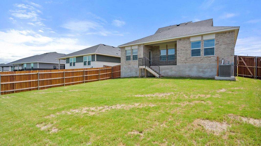 Exterior details and patio area of a home in Thunder Rock, Marble Falls (Image 25).