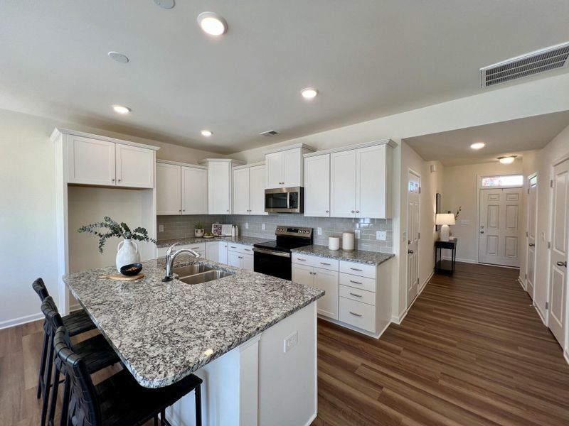 Furnished interior view inside a new home in Bellevue Townhomes, Greenville (Image 10).