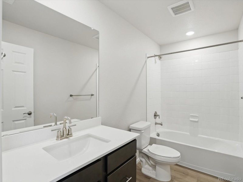 Furnished interior view inside a new home in Three Hills, Morrison (Image 7).