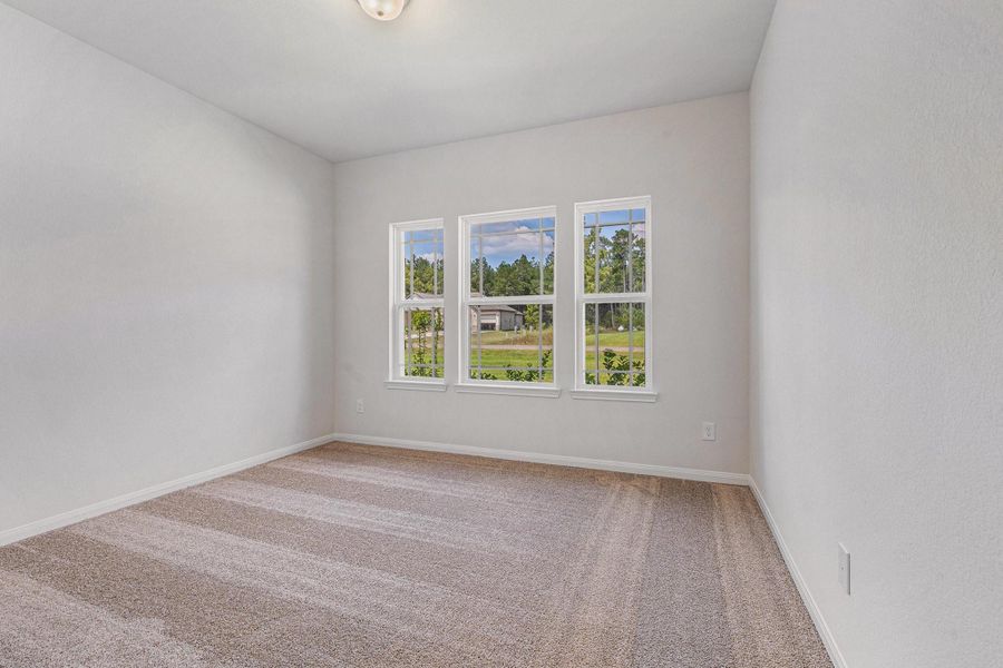 Spacious, unfurnished interior of a new home in Deer Pines, Conroe (Image 34).