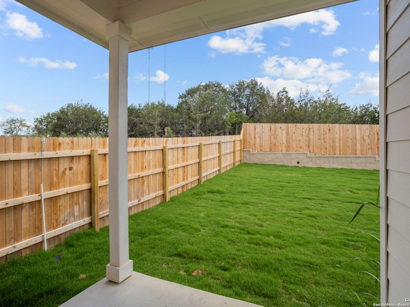 Exterior details and patio area of a home in Royal Crest, San Antonio (Image 3).