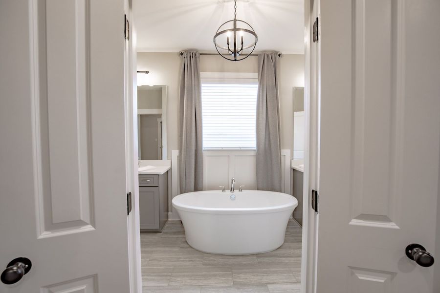 Representative furnished interior of a home built from the Willow by Grant & Co in Manor at Hall Creek, Arlington (Image 14).