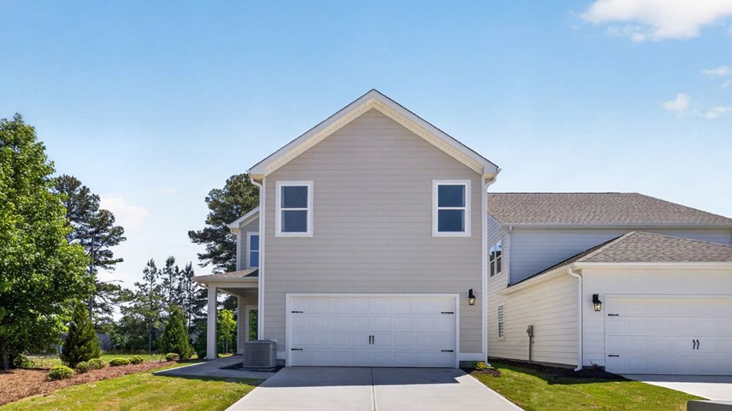 Representative exterior photo of a completed home built from the Alec by D.R. Horton in Madden West, Fuquay Varina, NC (Image 25).