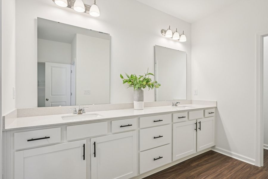 Representative furnished interior of a home built from the Caswell II by Ashton Woods in Crescent Mills, Wilson's Mills (Image 10). Representative furnished interior of a home built from the Caswell II by Ashton Woods in Crescent Mills, Wilson's Mills (Image 10).