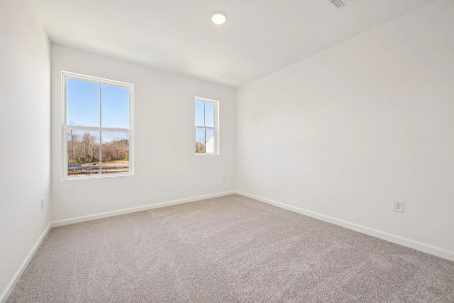 Spacious, unfurnished interior of a new home in Towns at Crescent Mills, Wilson's Mills (Image 19). Spacious, unfurnished interior of a new home in Towns at Crescent Mills, Wilson's Mills (Image 19).