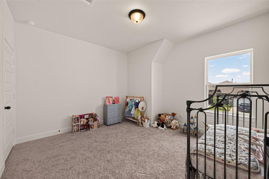 Another generously sized secondary bedroom offers comfort for family or guests. Another generously sized secondary bedroom offers comfort for family or guests.