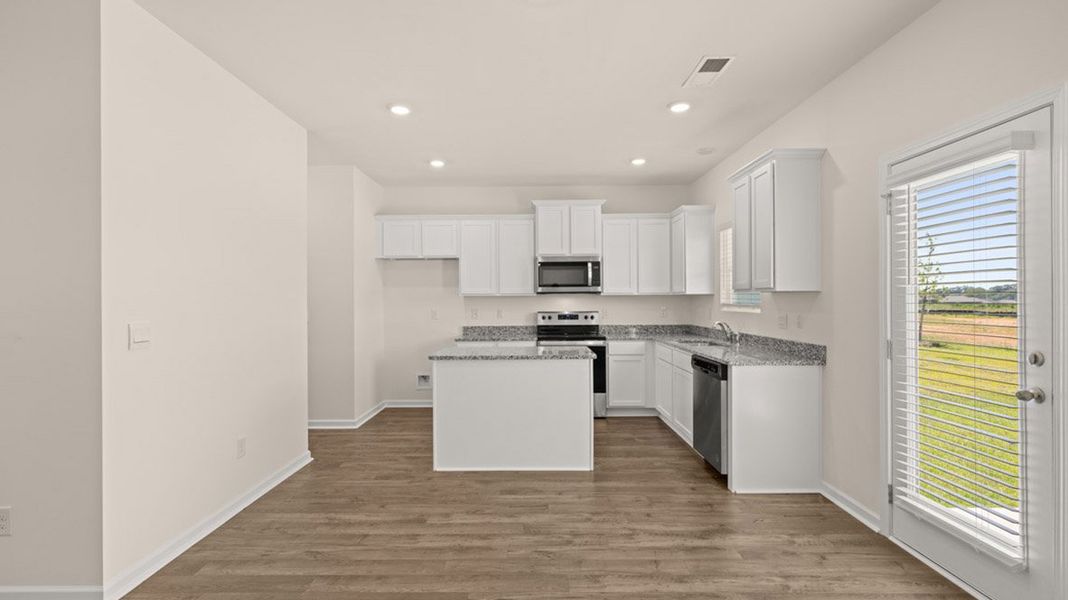 Representative furnished interior of a home built from the Vivian by D.R. Horton in The Preserve at Agricultural Village, Perry (Image 6). Representative furnished interior of a home built from the Vivian by D.R. Horton in The Preserve at Agricultural Village, Perry (Image 6).