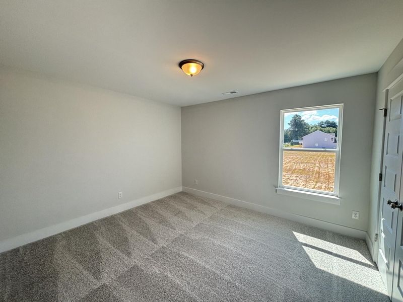 Spacious, unfurnished interior of a new home in Daniel Farms, Benson (Image 30).