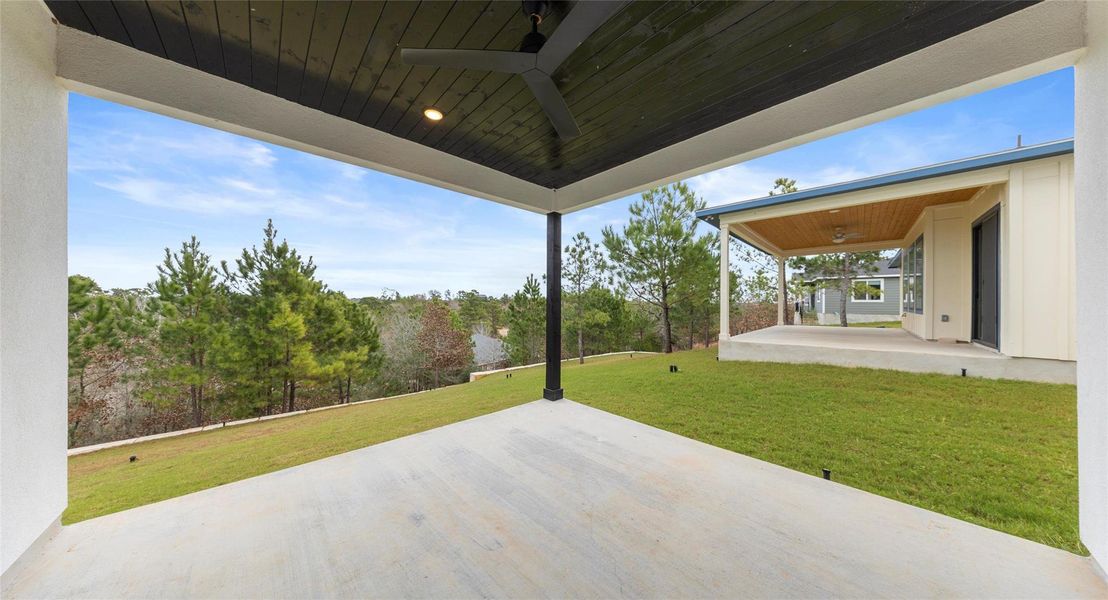 View of patio with ceiling fan