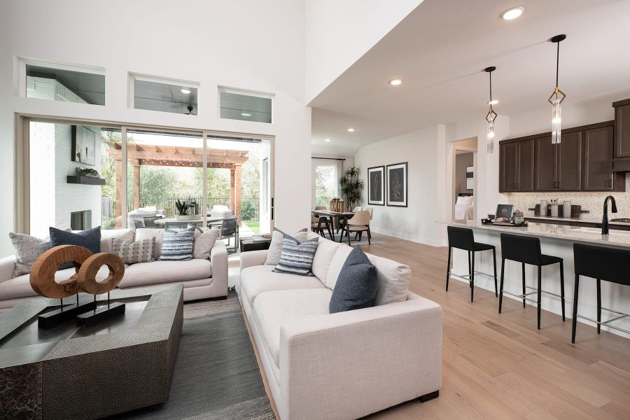 Representative furnished interior of a home built from the Logan by Tri Pointe Homes in Painted Tree, McKinney (Image 9).