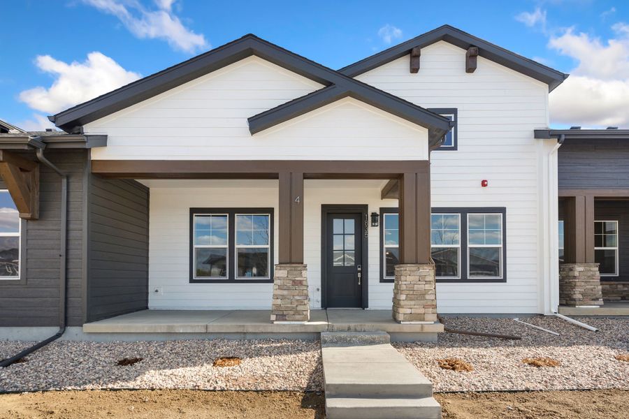 Front exterior of a home in the Villa Collection community, located in Fort Collins, CO (Image 9).