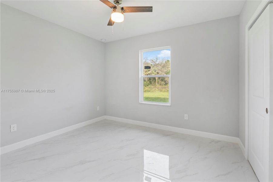 Spacious, unfurnished interior of a new home in , Lehigh Acres (Image 9).