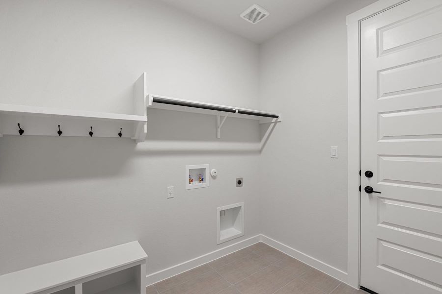 Furnished interior view inside a new home in Lagos Reserve, Manor (Image 16).