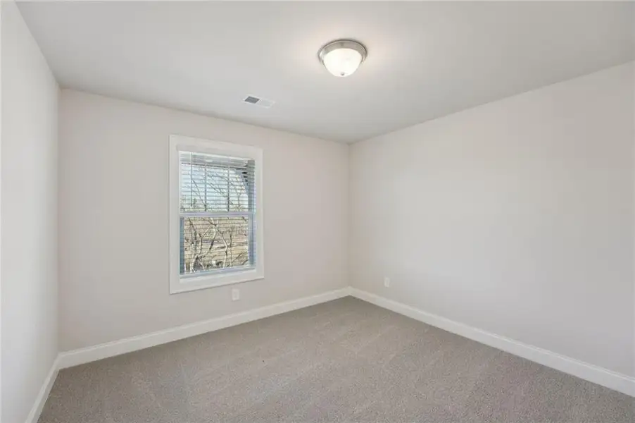 Spacious, unfurnished interior of a new home in Hemingway - Highland Series, Cumming (Image 45).