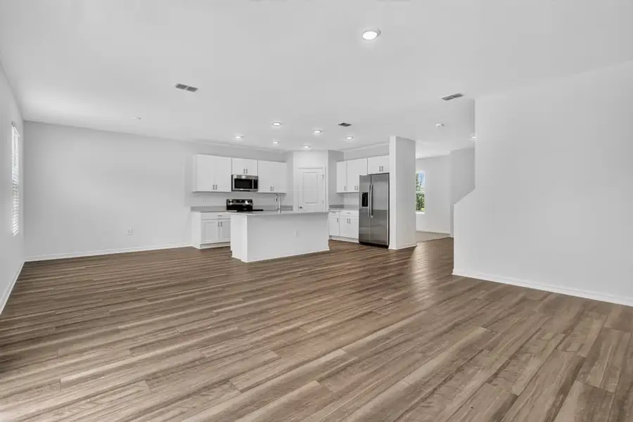 Representative unfurnished interior of a home built from the Kingfisher by Taylor Morrison in Palm Wind, Hudson (Image 23).