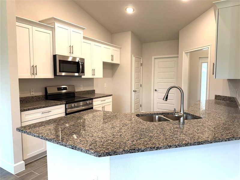 Furnished interior view inside a new home in Rotonda, Rotonda West (Image 8).