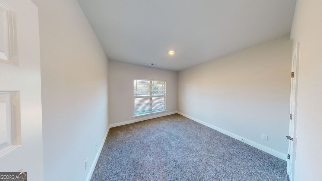 Spacious, unfurnished interior of a new home in Holliday Pass, Griffin (Image 17).