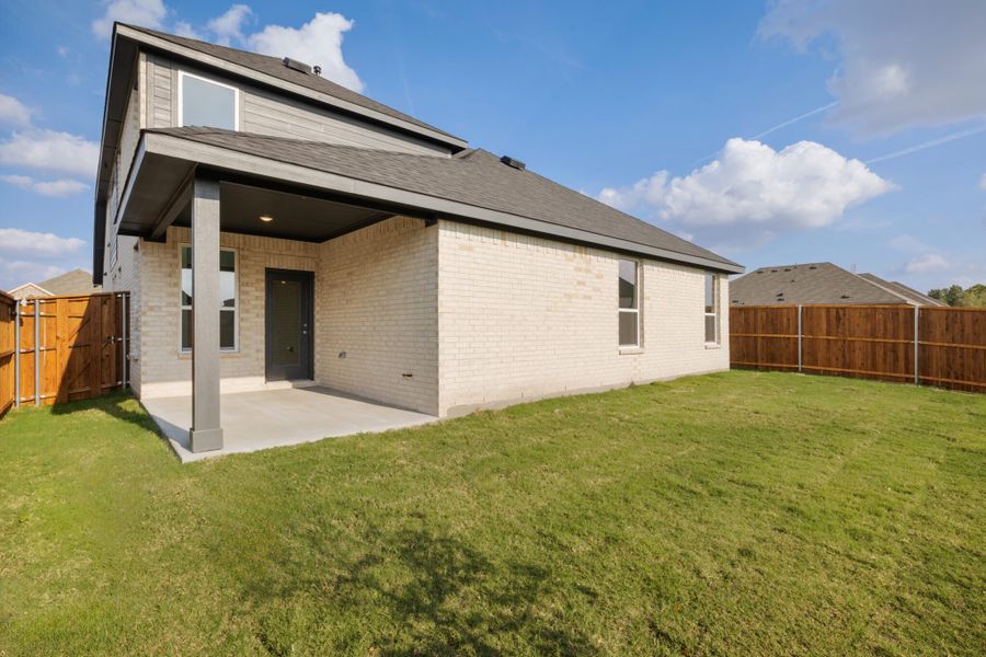 Exterior details and patio area of a home in Walden Pond, Forney (Image 26).
