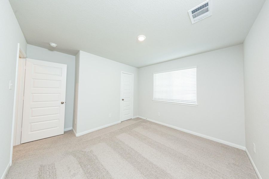 Spacious, unfurnished interior of a new home in River's Edge, Conroe (Image 17). Spacious, unfurnished interior of a new home in River's Edge, Conroe (Image 17).