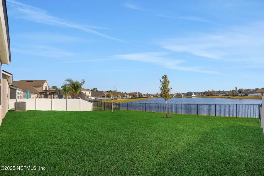 Exterior details and patio area of a home in Cross Creek, Green Cove Springs (Image 4).