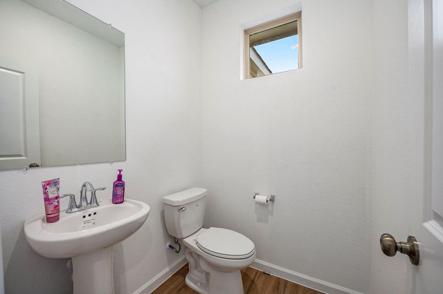 Convenient powder bath located near the front of the home. Convenient powder bath located near the front of the home.