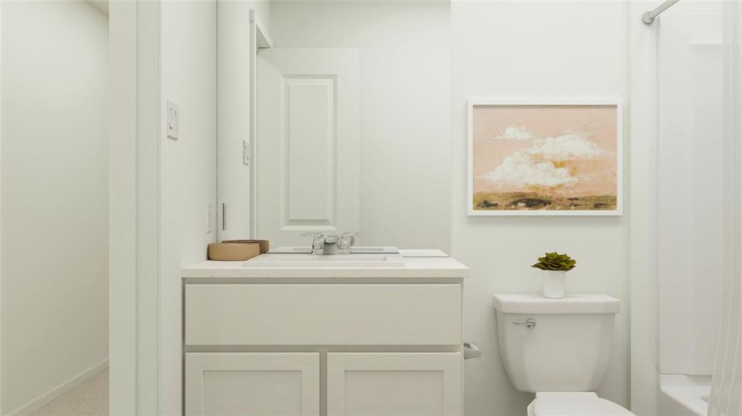 Bathroom with vanity and toilet