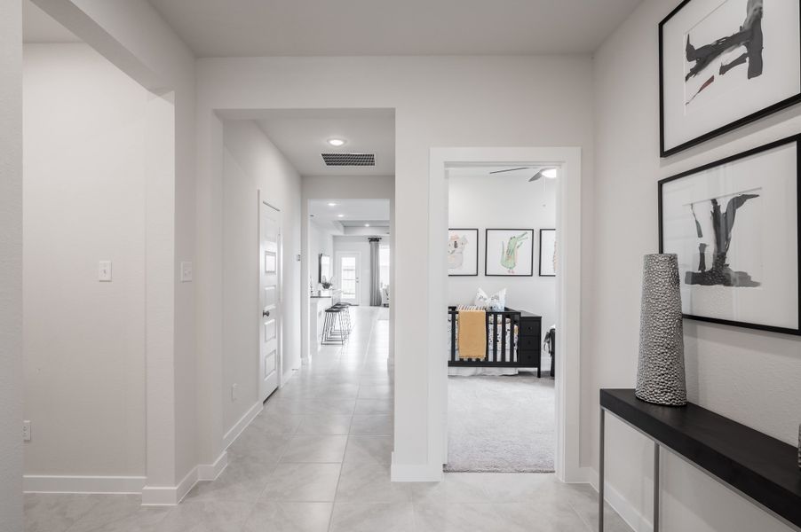 Representative furnished interior of a home built from the Caddo by Tri Pointe Homes in Mason Woods, Cypress (Image 34).