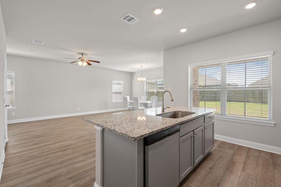 Furnished interior view inside a new home in Sunterra, Katy (Image 6).