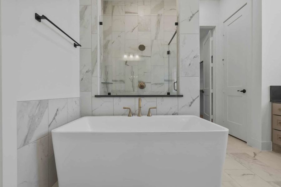 Representative furnished interior of a home built from the Nicklaus by Chesmar Homes in Riceland Alley Loads, Mont Belvieu (Image 18).